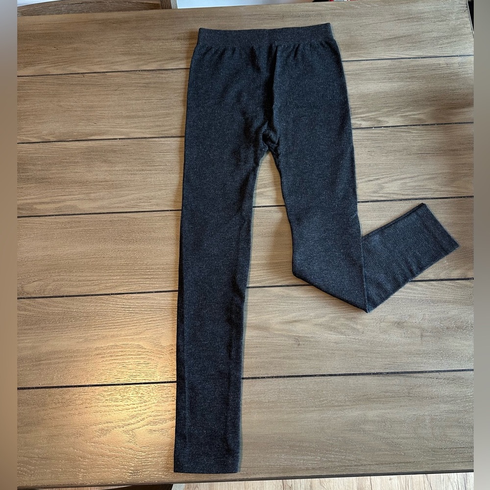 Never been worn black leggings with slight shimmer throughout.